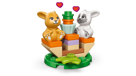 LEGO Friends: Heartlake City Bunny Hotel building block set with animal figures on a green background