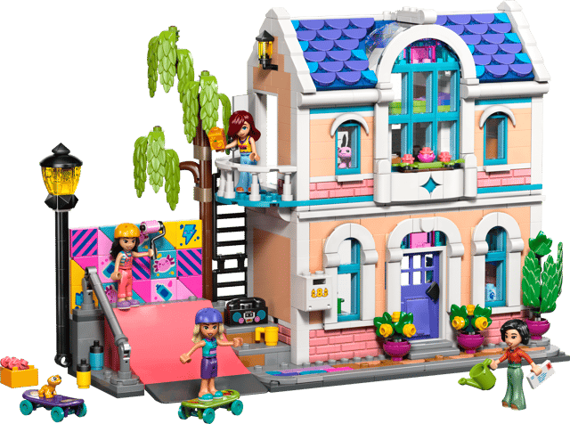 LEGO Friends: Liann's Family House with multiple levels, colorful exterior, and small figures on a transparent background