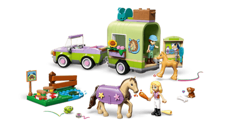 LEGO Friends: Horse & Baby Foal Trailer set with a camper, horse, and various accessories on a transparent background