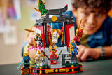 Child playing with a LEGO Ninjago: Ninja Character Display 15th Anniversary set featuring various characters and a temple-like structure.