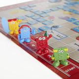 Colorful game pieces on a Scrabble Junior board