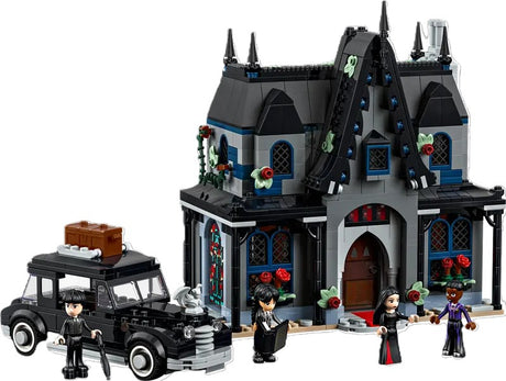 LEGO 'Wednesday' set with gothic house and characters, including packaging.