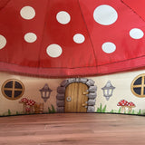 Children's Mushroom House Air Fort designed like a mushroom with a wooden door and cartoonish decorations.