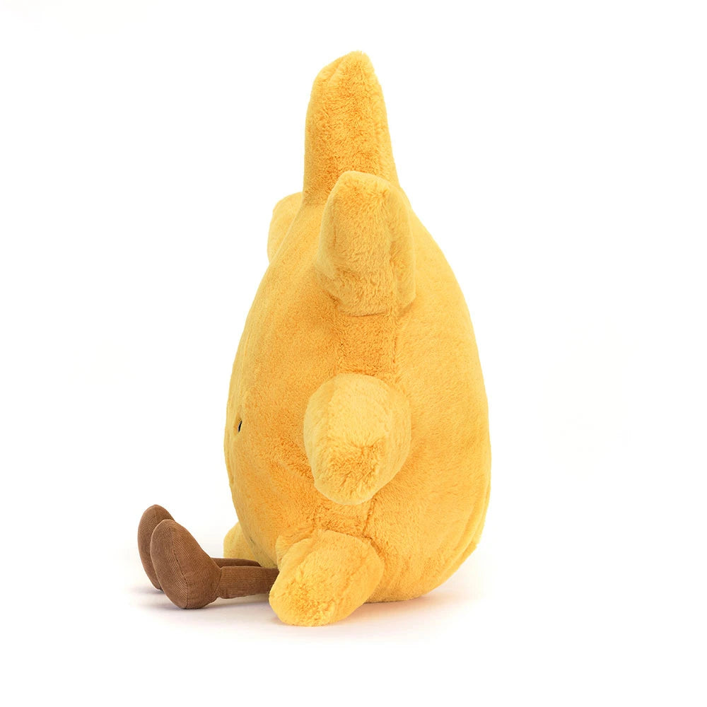 Side view of a yellow plush Amuseables Sun Huge with brown legs on a white background