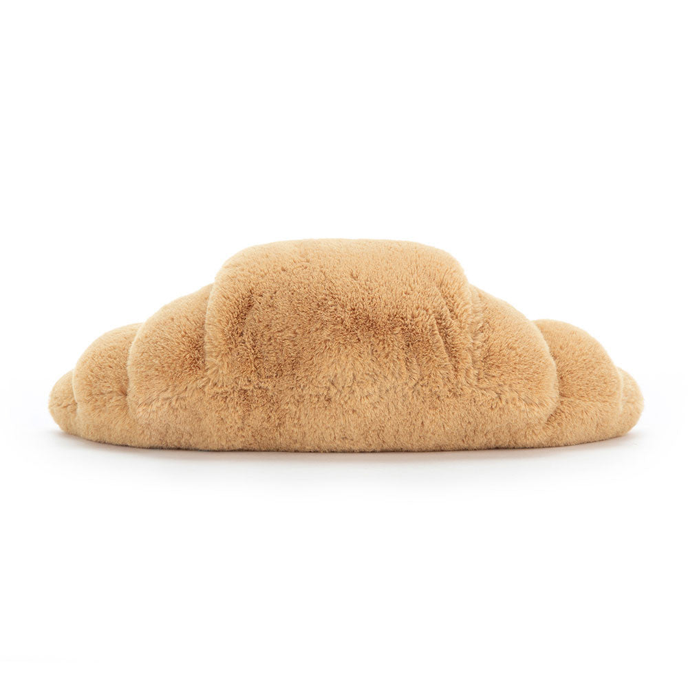 Rear view of a plush toy Amuseables Croissant on a white background