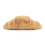 Rear view of a plush toy Amuseables Croissant on a white background