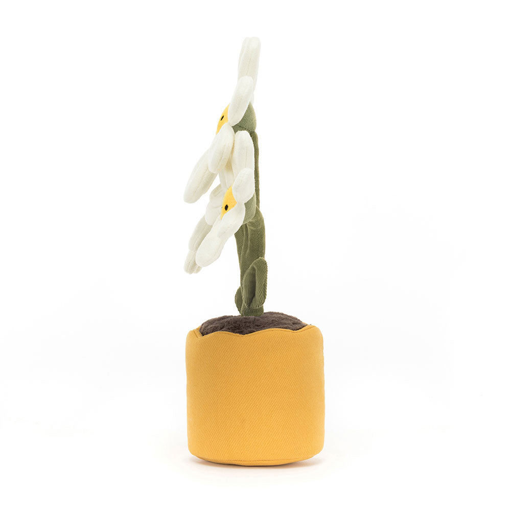 Side view of a plush toy Amuseables Daisy with white flowers on a white background