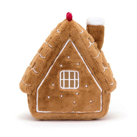 Soft plush toy designed as a cozy gingerbread house with white icing details and a red chimney top, named Amuseables Gingerbread House.