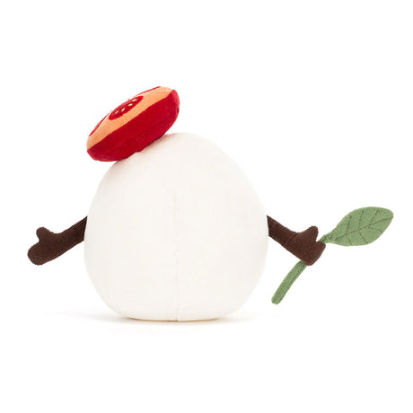 Plush Amuseables Mozzarella with a red tomato slice on top, brown arms, and green leaf on a white background