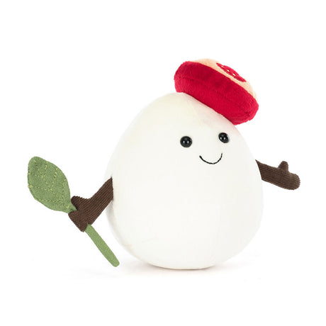 Plush toy Amuseables Mozzarella with a red tomato hat, green leaf, and brown arms on a white background