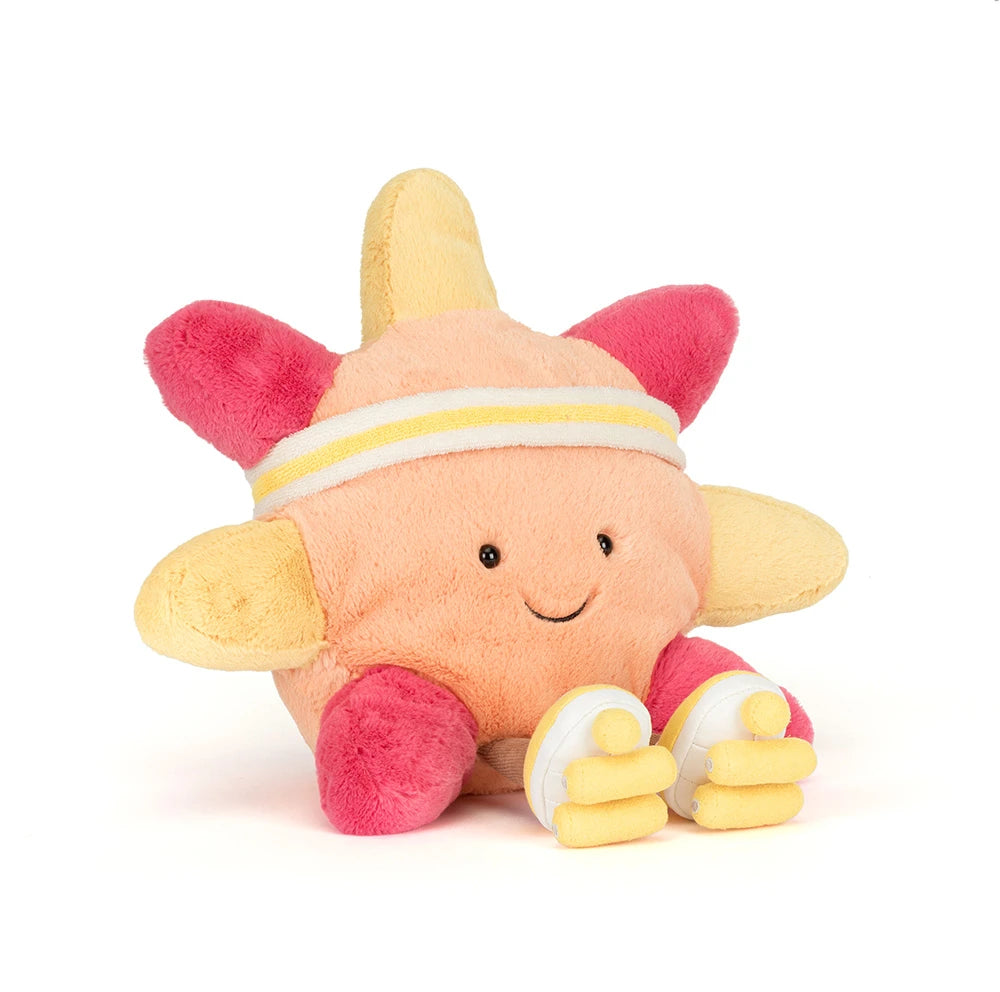 Amuseables Sun 'Roller Skates' is a soft plush toy shaped like a cheerful sun wearing a sporty headband and cute roller skates, perfect as a fun kid's toy.