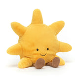 Yellow plush Amuseables Sun toy with a smiling face on a white background