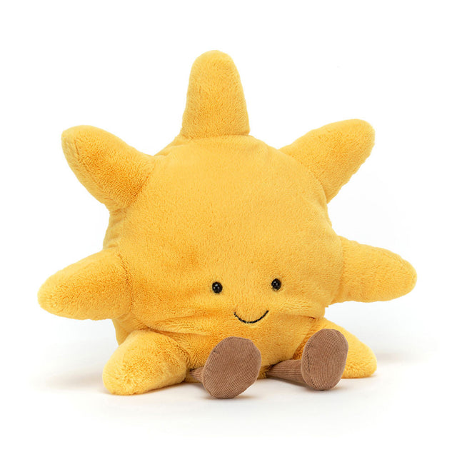 Yellow plush Amuseables Sun toy with a smiling face on a white background