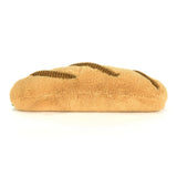 Rear view of a Amuseables Caprese Baguette on a white background
