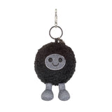 Amuseables Black Hole Bag Charm with a smiling face on a white background