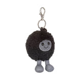 Amuseables Black Hole Bag Charm plush keychain with a smiling face on a white background