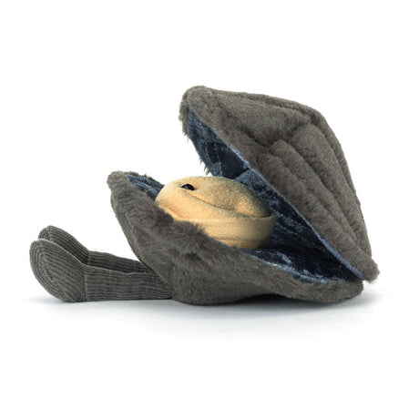 Soft plush toy of a gray clam shell partially open, revealing a smiling beige mussel inside, named Amuseables Michelle Mussel, lying on a white background.