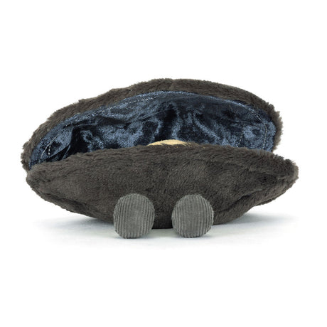 Soft plush toy shaped like an open dark gray mussel shell with a shiny blue interior and two small corduroy-textured legs, designed as Amuseables Michelle Mussel.