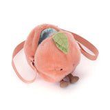Amuseables Peach Shoulder Bag designed as a soft, plush peach with a green leaf detail, adjustable strap, and an open compartment lined with light blue fabric.