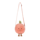 Amuseables Peach Shoulder Bag is a round, plush peach-shaped bag with a smiling face, leaf detail on top, and adjustable peach-colored shoulder strap.