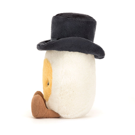 Soft plush toy resembling a boiled egg wearing a black top hat and brown shoes, designed as the Amuseable Boiled Egg Groom, perfect as a whimsical kid's gift.