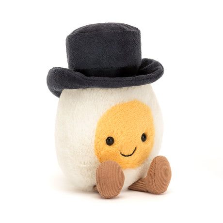 Plush toy resembling a boiled egg with a smiling face, wearing a black top hat and brown shoes, named Amuseable Boiled Egg Groom from Grandrabbit's Toy Shoppe.