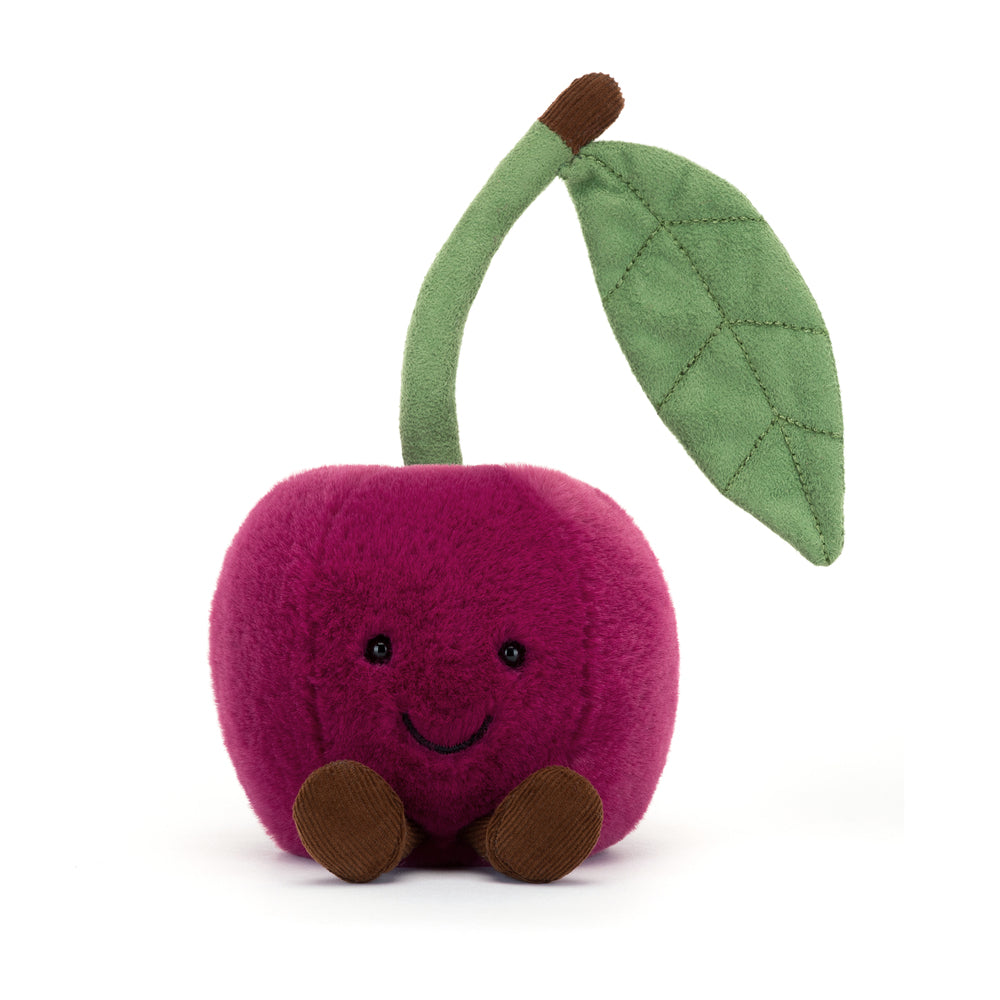 Amuseables Cherry is a soft plush toy in the shape of a smiling cherry with a green stem and leaf, perfect as a cheerful kids’ stuffed toy gift.