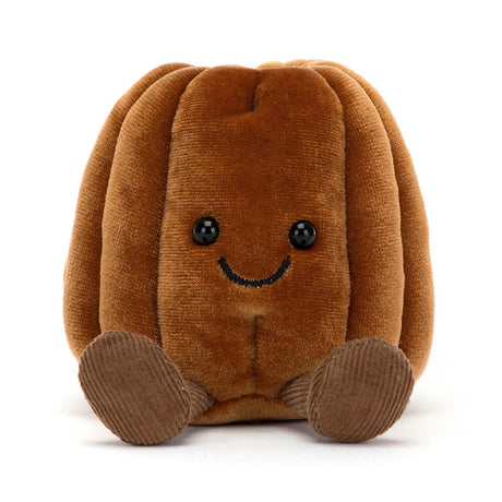 Brown plush Amuseables Carole Canelé with a smiling face on a white background