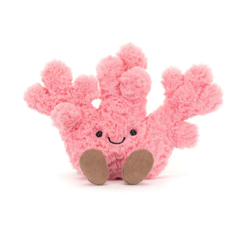 Pink plush Amuseables Coral toy with a happy face on a white background