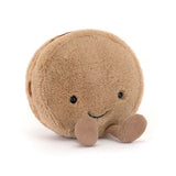 Soft brown plush toy with a smiling face and small legs, designed as an Amuseables Mona Macaron, perfect as a charming stuffed toy for kids.