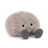 Amuseables Pebble plush toy with soft, fuzzy texture, round shape, embroidered eyes and smile, sitting with small fabric feet, perfect as a cuddly children's toy.