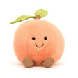 Amuseables Peach is a soft, round plush toy with a smiling face, felt green leaves on top, and small corduroy feet, perfect as a cute toddler toy or kid's gift.