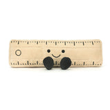 Soft plush toy designed as a beige Amuseables Ruler with black embroidered measurement marks, a smiling face, and two small black feet, perfect as a playful educational gift.
