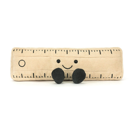 Soft plush toy designed as a beige Amuseables Ruler with black embroidered measurement marks, a smiling face, and two small black feet, perfect as a playful educational gift.