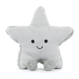 Soft plush toy in the shape of a smiling star with gray feet, named Amuseables Silver Star, perfect as a cuddly companion for kids and a charming addition to any toy collection.