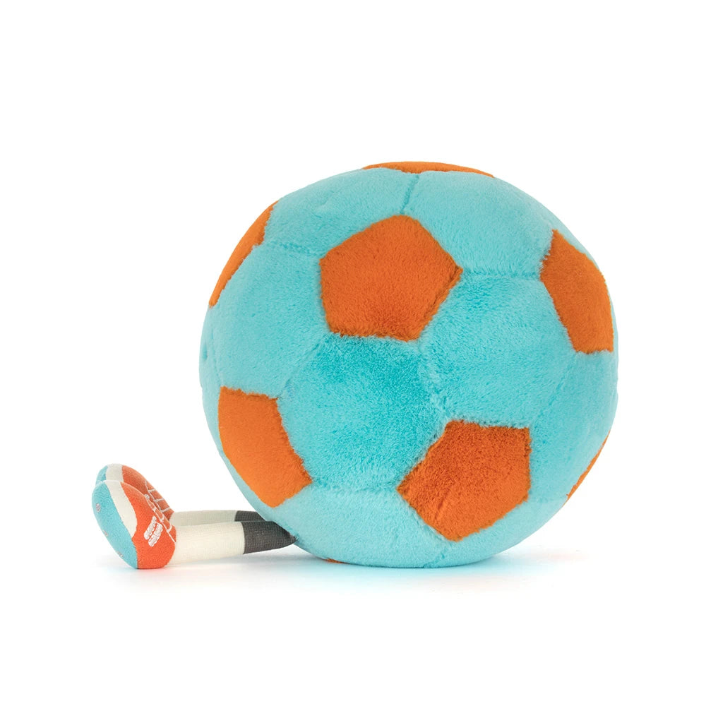 Soft plush toy shaped like a blue and orange soccer ball with a small attached white and orange tag, featuring the Amuseables Jellycat Soccer Ball design.