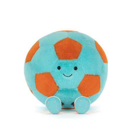 Soft plush ball toy in blue and orange with a smiling face and small feet, designed as the Amuseables Jellycat Soccer Ball.
