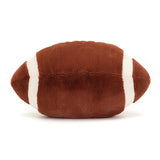 Soft plush toy shaped like a brown football with white stripes, designed for kids to enjoy as part of the Football Sports Amuseables collection.
