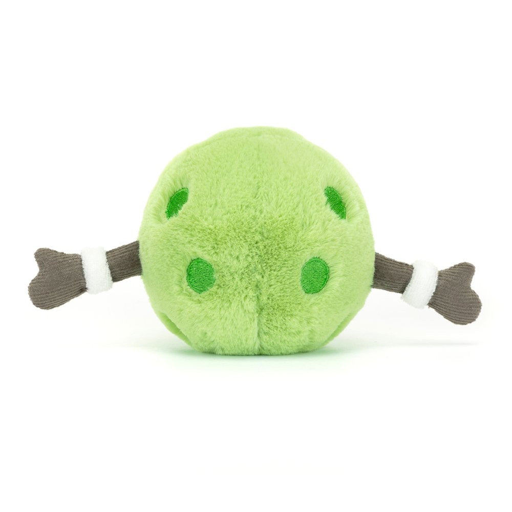 Soft green plush toy resembling a pickleball with attached brown arms and white wristbands, designed as the Amuseables Sports Pickleball.