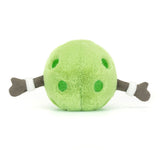 Soft green plush toy resembling a pickleball with attached brown arms and white wristbands, designed as the Amuseables Sports Pickleball.