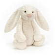 Bashful Cream Bunny Huge, a soft and cuddly cream-colored plush bunny with long floppy ears, perfect as a comforting stuffed animal for children.