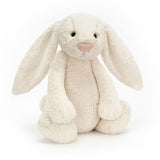 Bashful Cream Bunny Huge, a soft and cuddly cream-colored plush bunny with long floppy ears, perfect as a comforting stuffed animal for children.