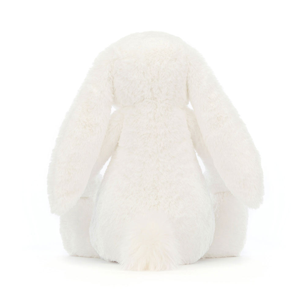Soft white plush toy with long floppy ears and a fluffy tail, shown from the back, featuring the Bashful Luxe Bunny Luna design.