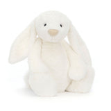 Soft and cuddly white plush Bashful Luxe Bunny Luna with long floppy ears, black eyes, and a beige nose, perfect as a toddler toy or stuffed animal gift.