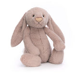 Soft and cuddly plush Bashful Luxe Bunny Rosa Huge with long floppy ears and a gentle expression, perfect as a comforting toddler toy or gift.