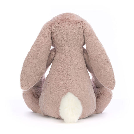 Bashful Luxe Bunny Rosa Huge plush toy shown from the back, featuring soft pink fur, long floppy ears, and a fluffy white tail, perfect as a cuddly stuffed animal gift.