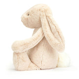 Soft plush beige bunny with long ears and a fluffy white tail, perfect as a cuddly companion for kids, featuring Bashful Luxe Bunny Willow Huge.