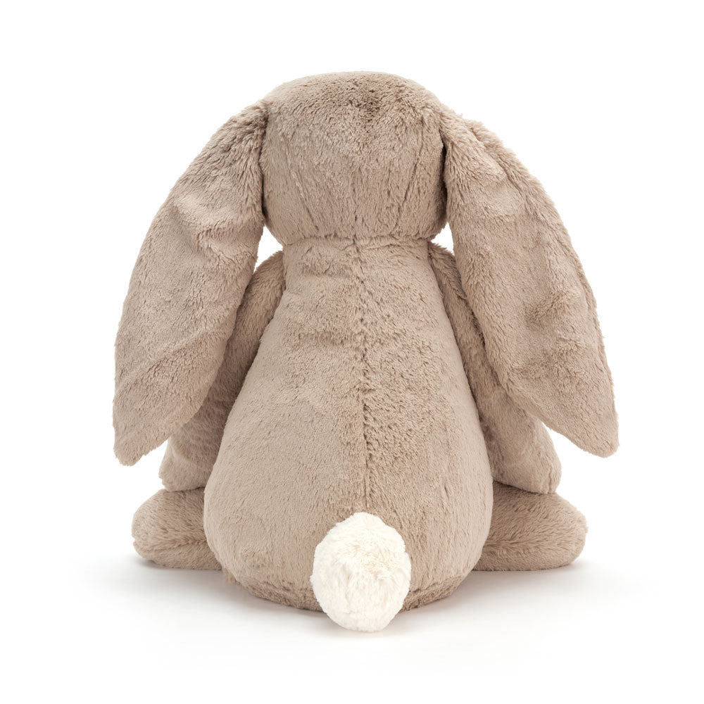 Bashful Beige Bunny Really Big plush toy shown from the back, featuring soft beige fur, long floppy ears, and a small white fluffy tail, perfect as a cuddly stuffed animal.