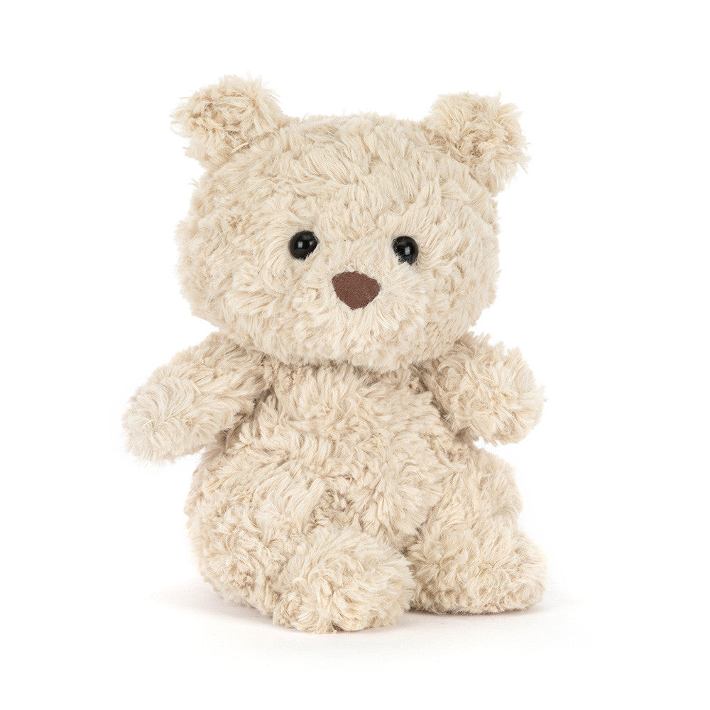 Cuddly beige Bartholomew Bear Junior on a white background