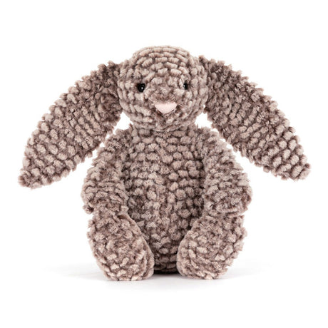 Soft and textured plush bunny toy with long floppy ears and a gentle expression, designed as Bashful Luxe Bunny Pine, perfect for cuddling and toddler play.
